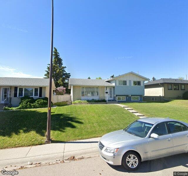 Street view of 7440 Huntertown Crescent NW, Calgary