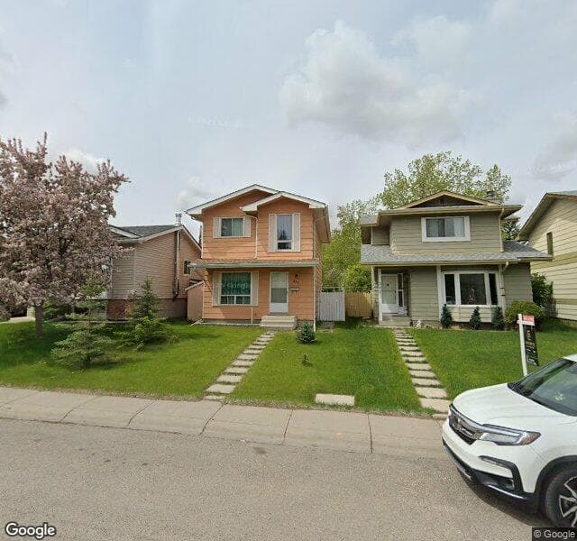 Street view of 213 Sunvale Crescent SE, Calgary