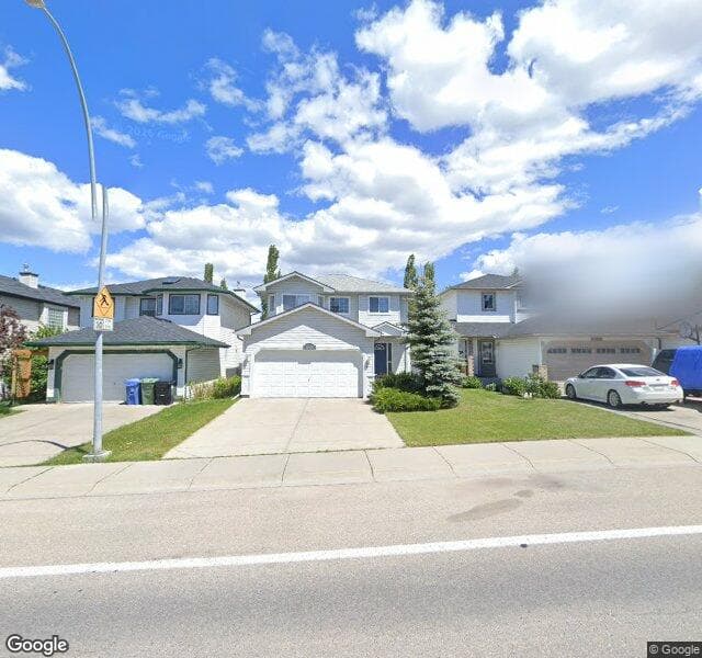 Street view of 10464 Hidden Valley Drive NW, Calgary