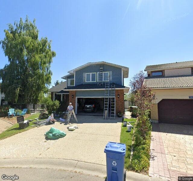 Street view of 511 Strathcona Mews SW, Calgary