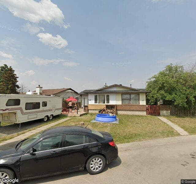 Street view of 49 Rundlelawn Court NE, Calgary
