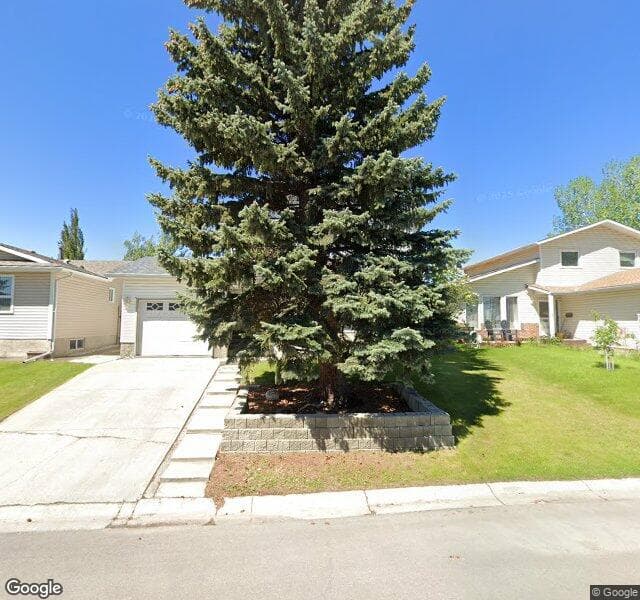 Street view of 24 Woodford Crescent SW, Calgary