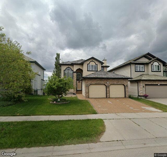 Street view of 371 Rocky Ridge Drive NW, Calgary