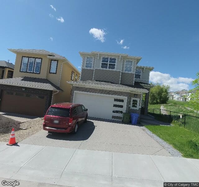 Street view of 304 Hamptons Drive NW, Calgary