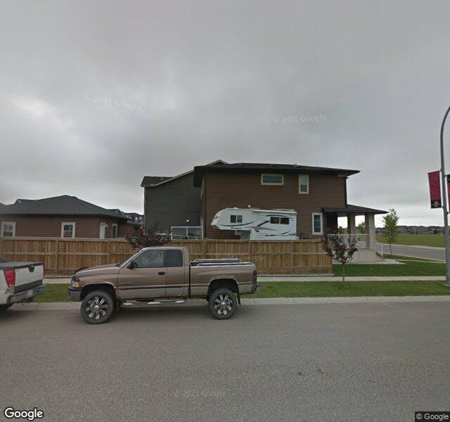 Street view of 1047 Evanston Drive NW, Calgary