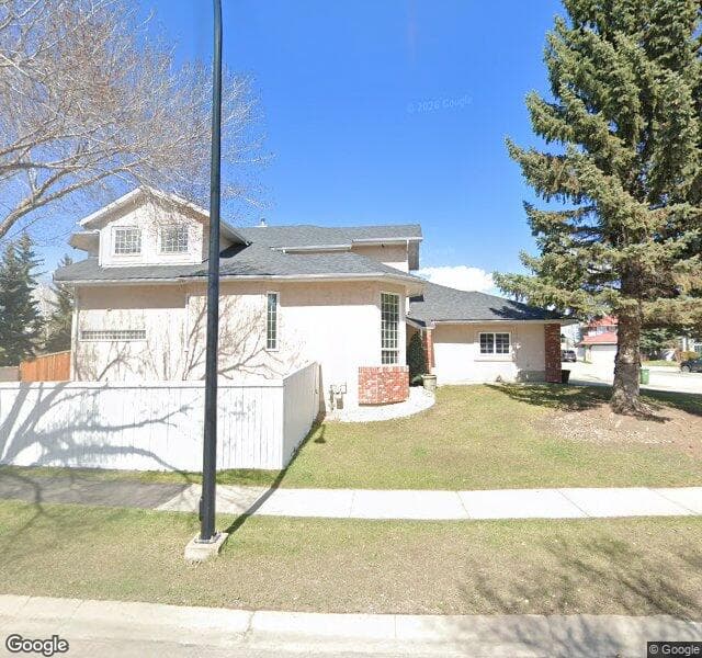 Street view of 103 Mckenzie Lake Bay SE, Calgary