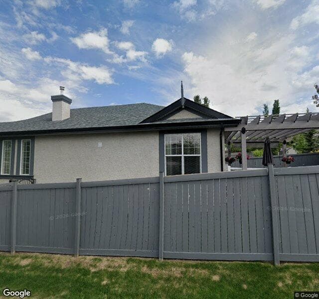 Street view of 87 Panamount Hill NW, Calgary