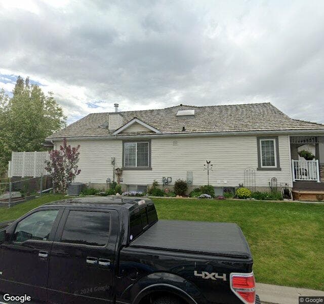 Street view of 67 Chaparral Close SE, Calgary