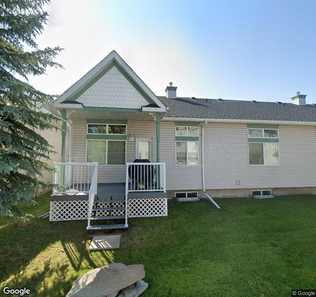 Street view of 38 Prestwick Pond Terrace SE, Calgary