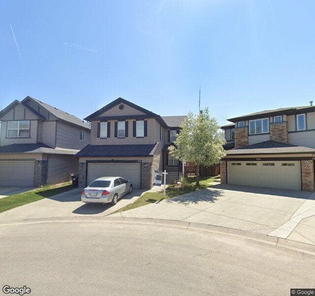Street view of 174 Cougarstone Close SW, Calgary