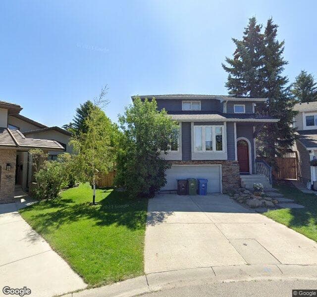 Street view of 32 Strathwood Bay SW, Calgary