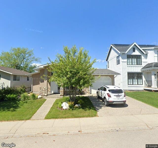 Street view of 6023 Lewis Drive SW, Calgary