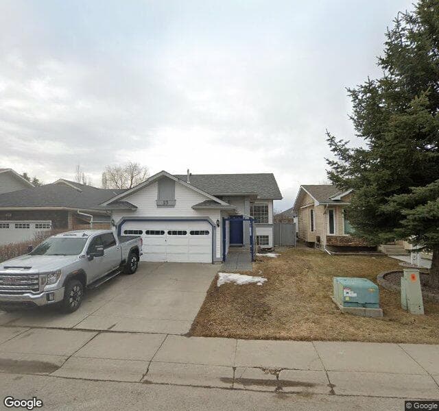 Street view of 23 Riverstone Crescent SE, Calgary