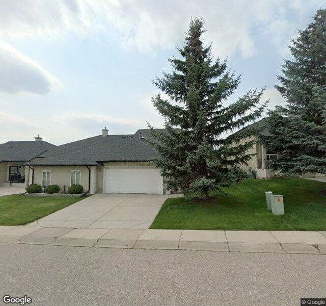 Street view of 47 Tuscany Village Court NW, Calgary
