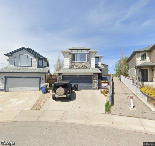 Street view of 64 Tuscany Ridge Crescent NW, Calgary