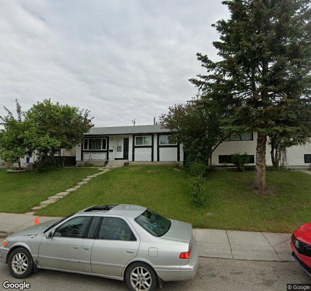 Street view of 891 Pinecliff Drive NE, Calgary