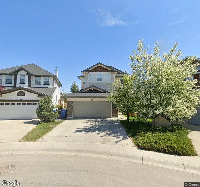 Street view of 52 Cougarstone Manor SW, Calgary
