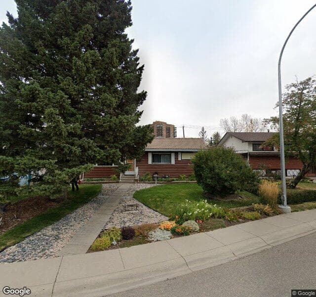 Street view of 36 Hutton Place SW, Calgary