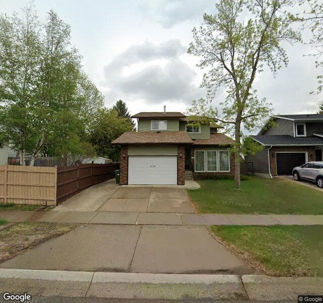 Street view of 636 Woodpark Boulevard SW, Calgary