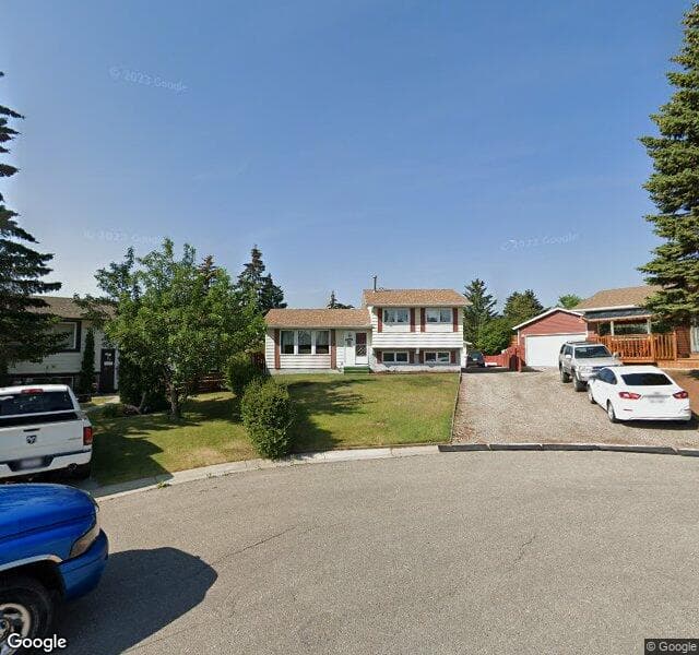 Street view of 31 Pinebrook Place NE, Calgary