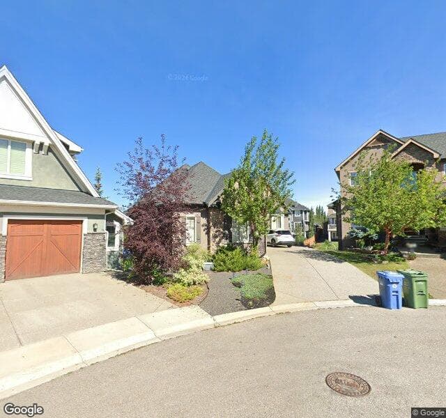 Street view of 525 Aspen Glen Place SW, Calgary