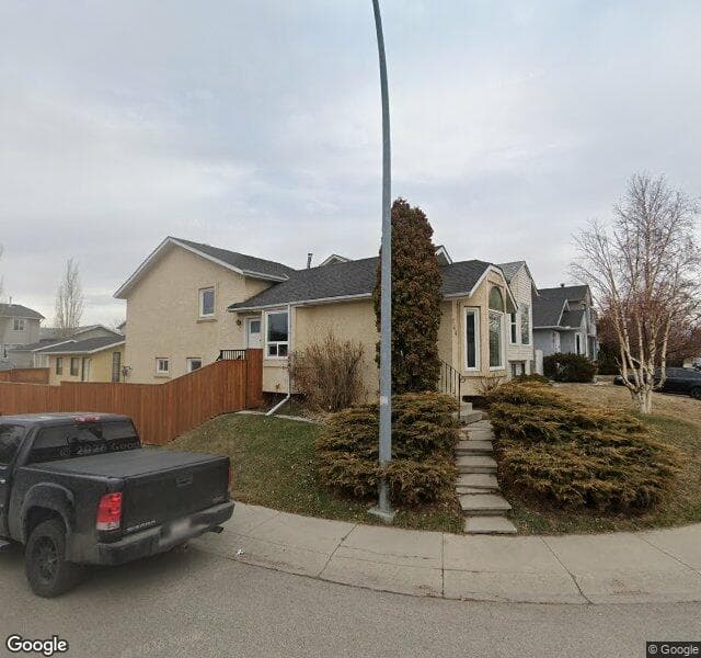 Street view of 144 Rivercrest Circle SE, Calgary