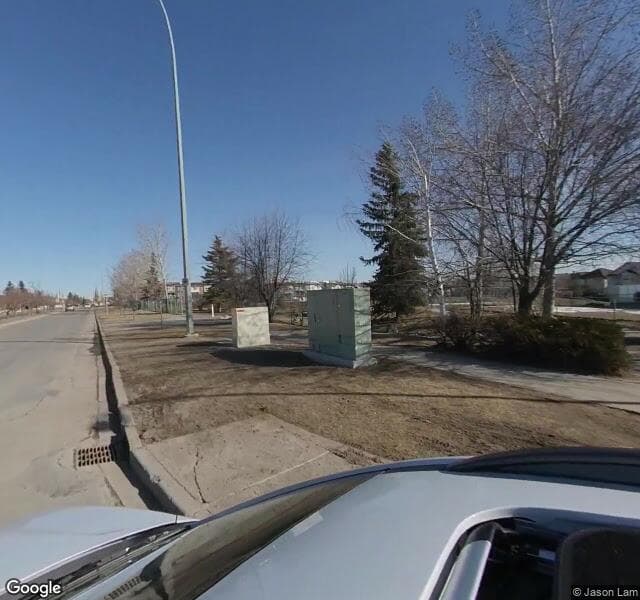 Street view of 1534 Harvest Hills Drive NE, Calgary
