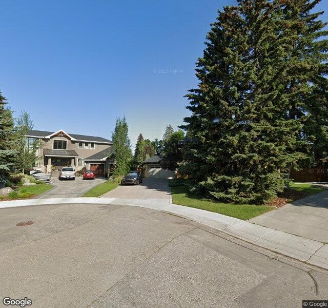 Street view of 12207 Lake Louise Way SE, Calgary