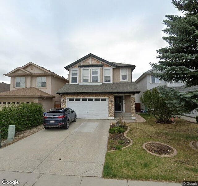 Street view of 130 Everwillow Close SW, Calgary