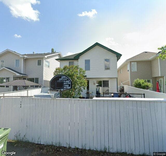 Street view of 162 River Rock Place SE, Calgary