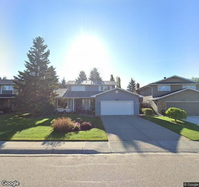 Street view of 12348 Lake Moraine Rise SE, Calgary