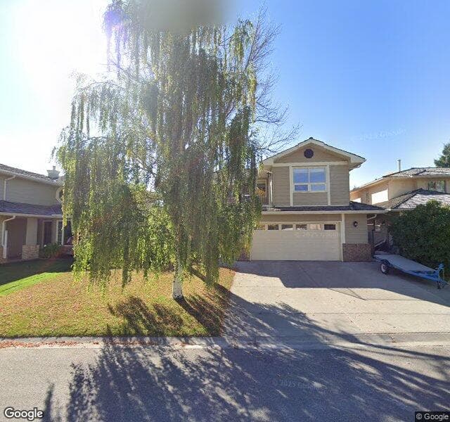 Street view of 104 Sunset Close SE, Calgary