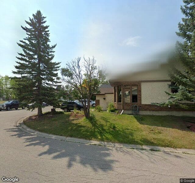 Street view of 205 Wood Valley Place SW, Calgary