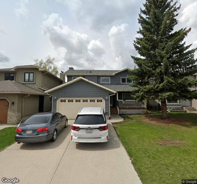 Street view of 21 Sunvista Crescent SE, Calgary