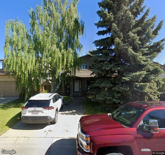 Street view of 108 Cedarbrook Way SW, Calgary