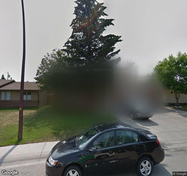 Street view of 47 Lake Lucerne Close SE, Calgary