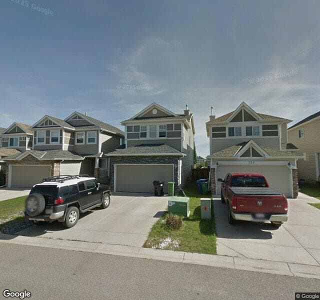 Street view of 118 Cougar Plateau Way SW, Calgary