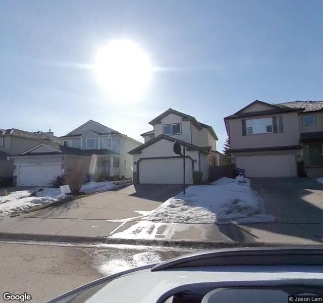 Street view of 1132 Harvest Hills Drive NE, Calgary