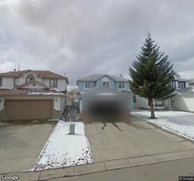 Street view of 57 Sandalwood Court NW, Calgary