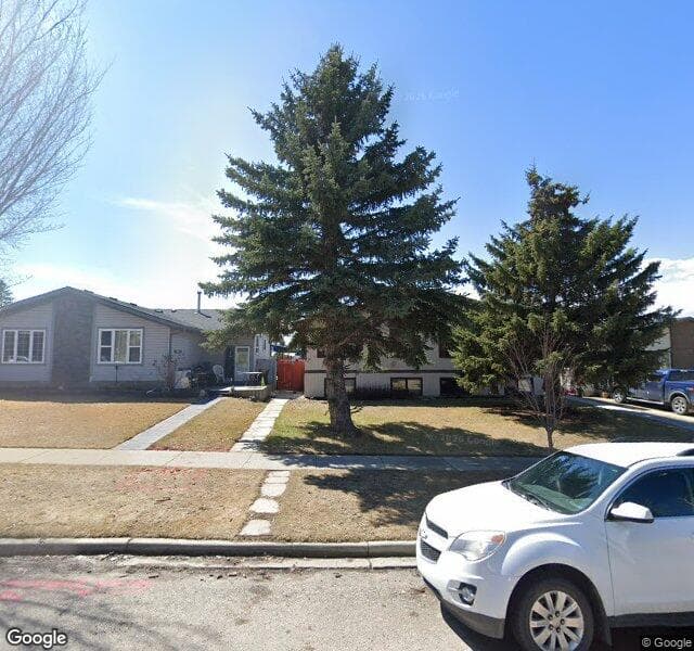Street view of 233 Queensland Place SE, Calgary