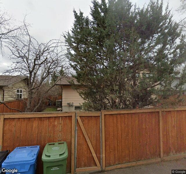Street view of 112 Lake Wood Place SE, Calgary
