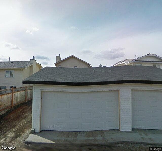 Street view of 48 Harvest Hills Drive NE, Calgary