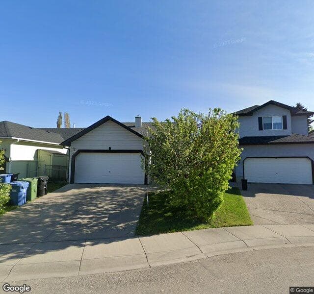 Street view of 64 Hidden Spring Close NW, Calgary