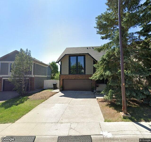 Street view of 52 Strathlorne Crescent SW, Calgary