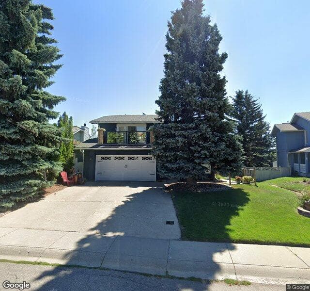 Street view of 32 Strathlorne Crescent SW, Calgary
