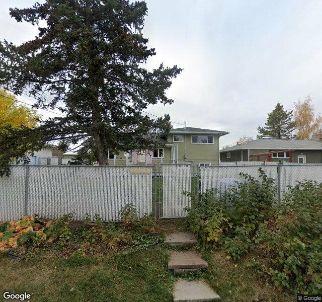Street view of 70 Hallbrook Place SW, Calgary