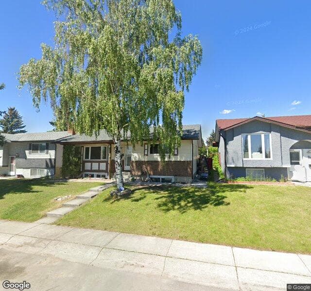 Street view of 888 Rundlecairn Way NE, Calgary