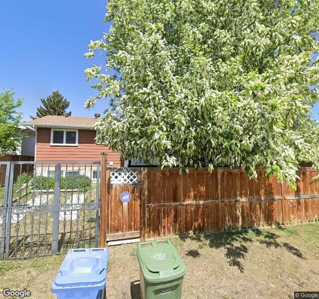 Street view of 516 Queensland Circle SE, Calgary