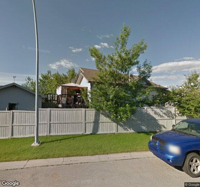 Street view of 32 Somerside Common SW, Calgary