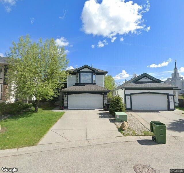 Street view of 258 Rocky Ridge Bay NW, Calgary